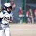Saline Kaylee Harmon runs to first in the game against on Monday, June 3. Daniel Brenner I AnnArbor.com